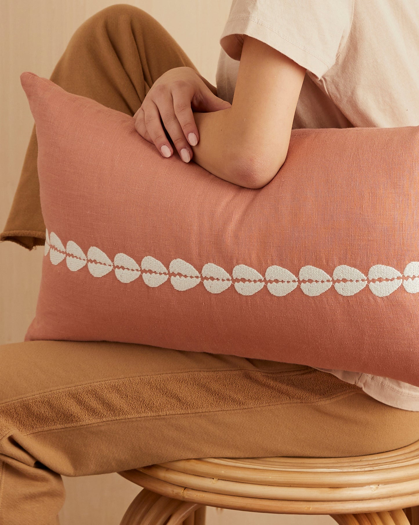 cowrie embroidered lumbar pillow cover in sandalwood